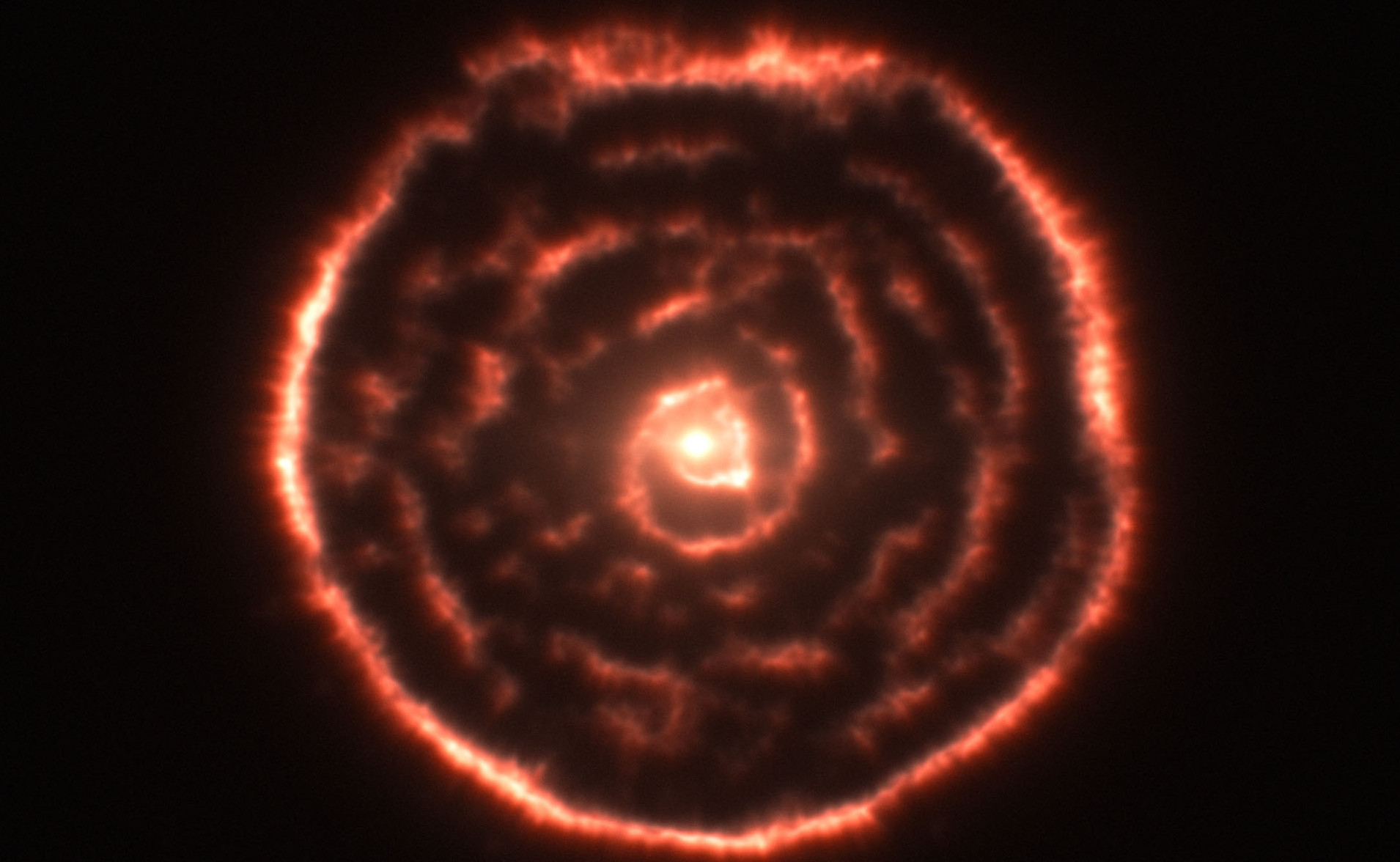 Observations using the Atacama Large Millimeter/submillimeter Array (ALMA) have revealed an unexpected spiral structure in the material around the old star R Sculptoris. This feature has never been seen before and is probably caused by a hidden companion star orbiting the star. This slice through the new ALMA data reveals the shell around the star, which shows up as the outer circular ring, as well as a very clear spiral structure in the inner material.